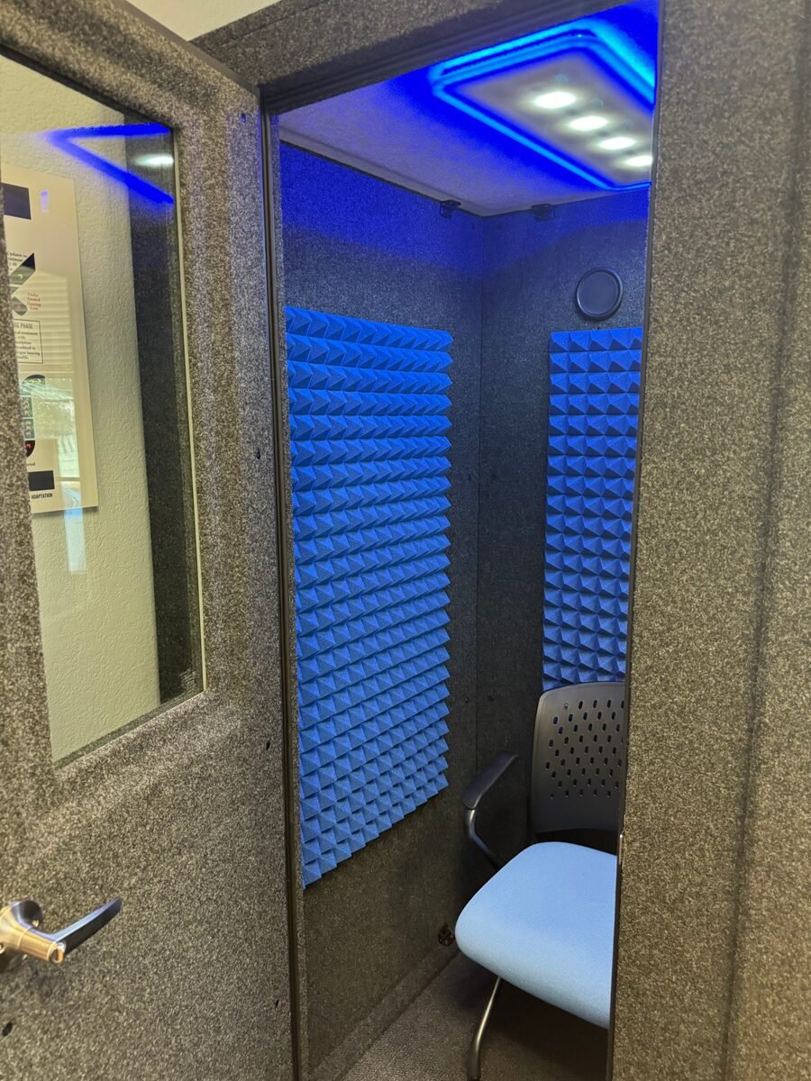 The sound-treated testing booth at Serenity Hearing Centers used for real ear measurement and verification